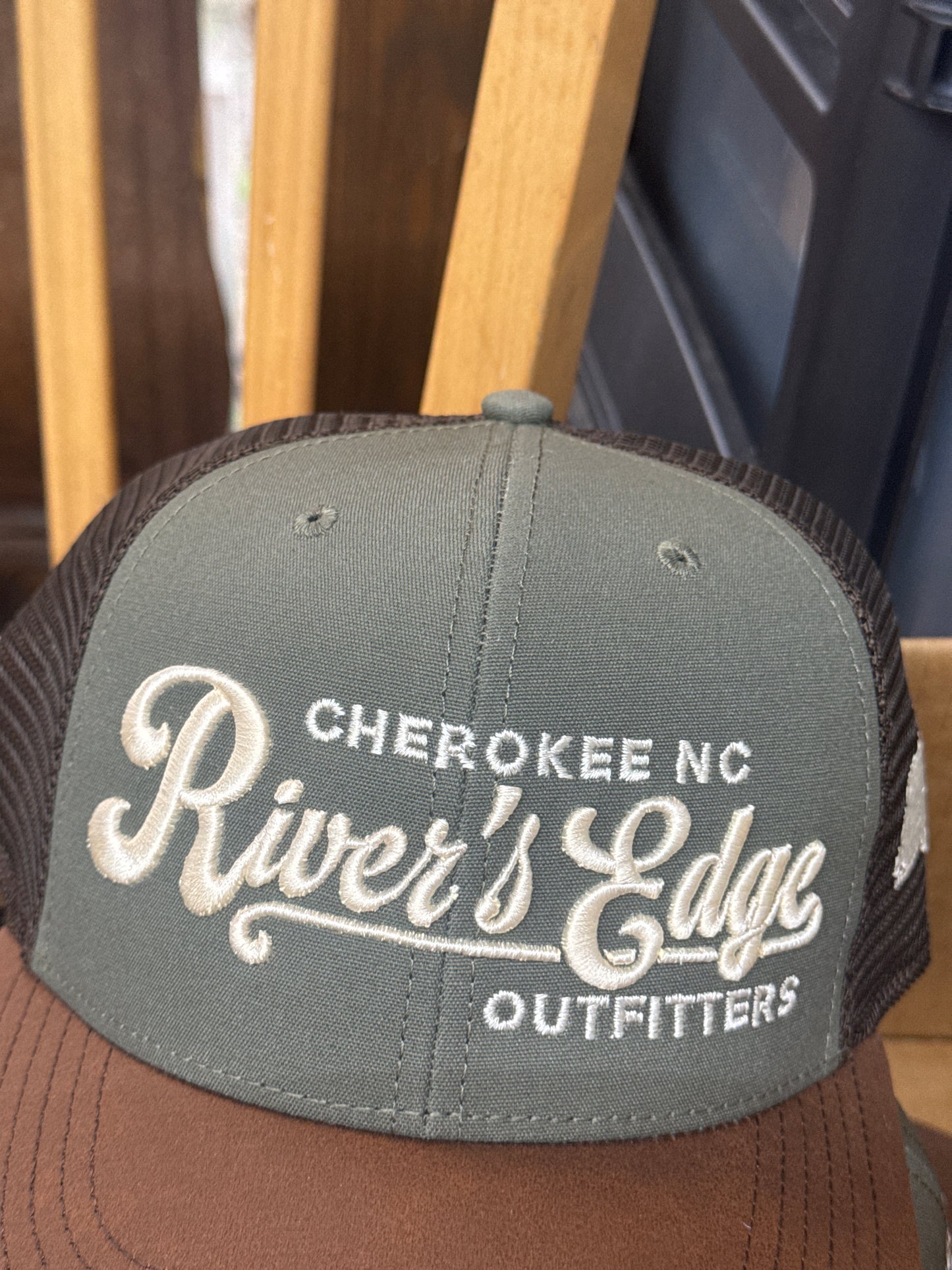 Reo hat white cursive